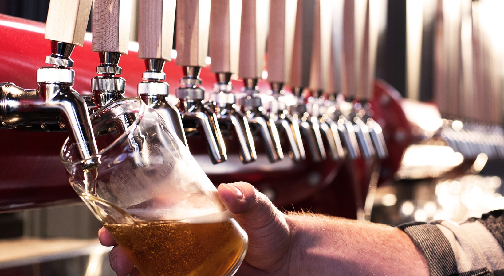 District Flats Lifestyle stock image of beer taps